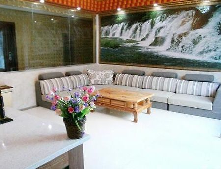 Yixinyuan Hotel Цзючжайгоу Экстерьер фото